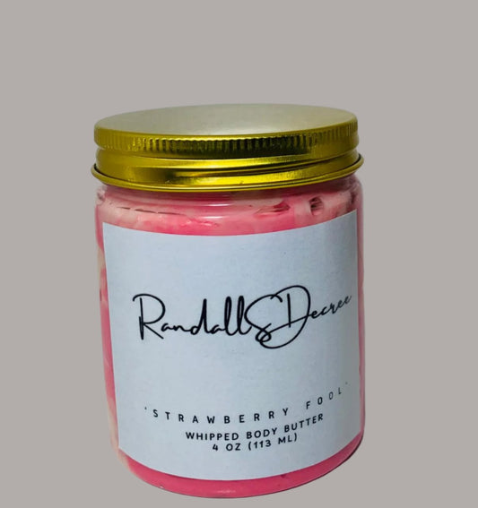 “Luxurious strawberry body butter in a jar with fresh strawberries.”